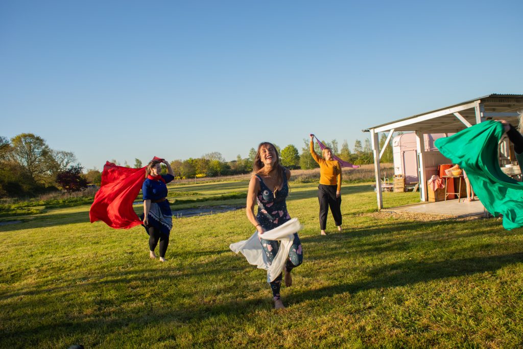 An image representing conscious movement and embodied wellbeing, showing a person moving with strength, balance, and freedom while connected to breath and body awareness. The scene reflects physical vitality, emotional balance, mental clarity, and creative expression through mindful movement tailored to the individual.