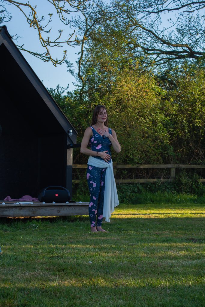 An image representing sound, meditation, and vocal expression, showing a person using breath, voice, and meditative presence to express emotion and inner truth. The scene conveys deep self-awareness, vibrational healing, and authentic expression through sound and conscious vocalisation.
